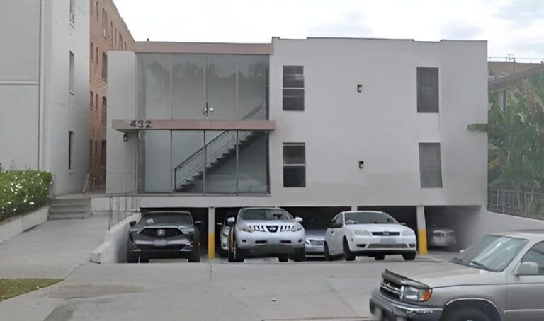 A building and a parking lot.