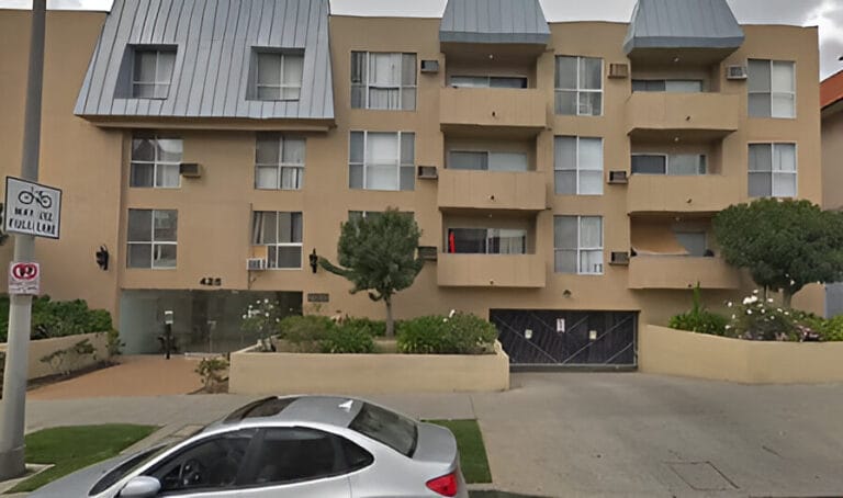 A large brown apartment building.
